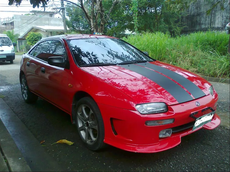 Mazda lantis photo - 8